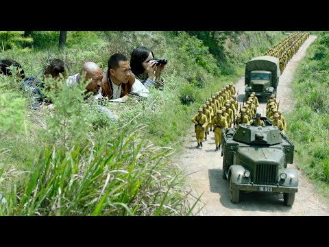 They ambush the marching Japanese troops and catch them completely off guard!