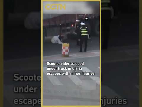 Scooter rider trapped under truck in China escapes with minor injuries