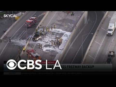 Part of 405 freeway closed in San Fernando Valley after hay truck catches fire
