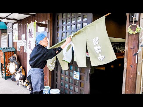 An old man at a Japanese udon restaurant handles an incredible amount of work all by himself