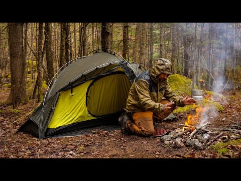 Camping in rain with Campfire Next to River With My Dog