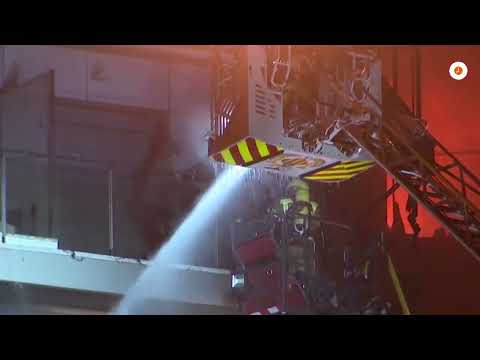 Firefighters rescue people from burning building in Spain | REUTERS