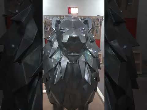 low poly lion sculpture made out of 304 grade stainless steel.