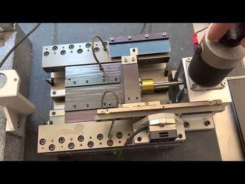 Ultra precision air bearing stage with friction bar drive (DTL Z axis)