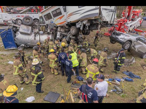 Jacksonville Fire Rescue Department has one trapped w/RV on a  truck requiring technical rescue team