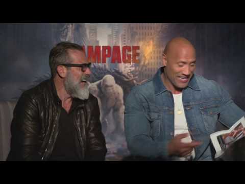 The Rock & Jeffrey Dean Morgan laugh at an old photo of The Rock, Rampage, John Cena