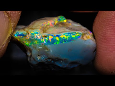 Miner parts with a 20yr old piece of rough opal treasure - I cut it!