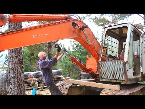 Fixing leaky Boom Cylinders on the Abandoned Excavator..