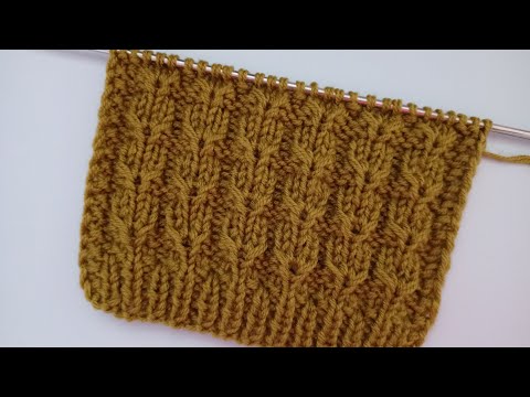 Простой, ОЧЕНЬ симпатичный рельефный узор спицами.