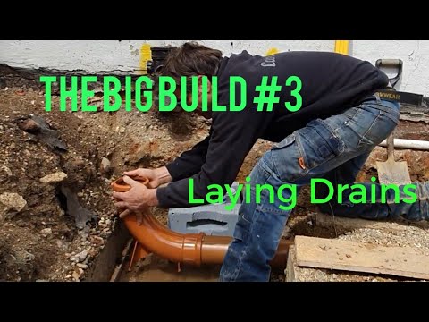 Laying the 110mm plastic underground drainage pipes