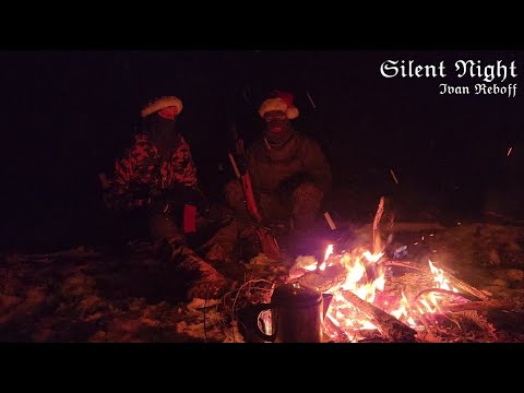 Silent Night but you are sitting around a campfire as it snows on Christmas