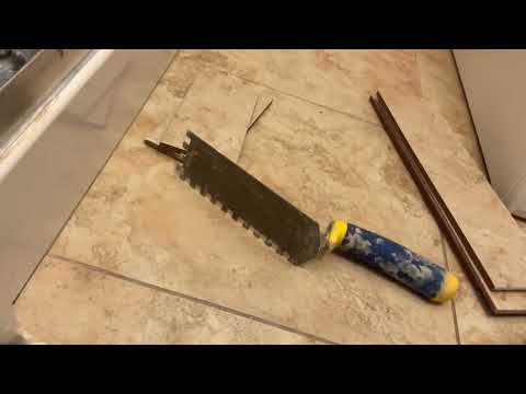 Bathroom tile floor repair, broken tile replacement