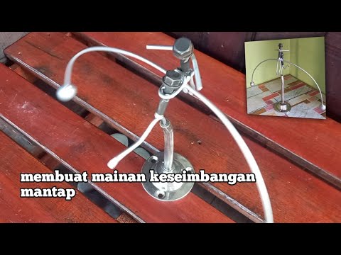 Menari diatas tongkat dengan keseimbangan