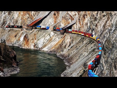BIG DOUBLE STACK TRAINS SNAKING THRU THE RUGGED THOMPSON CANYON