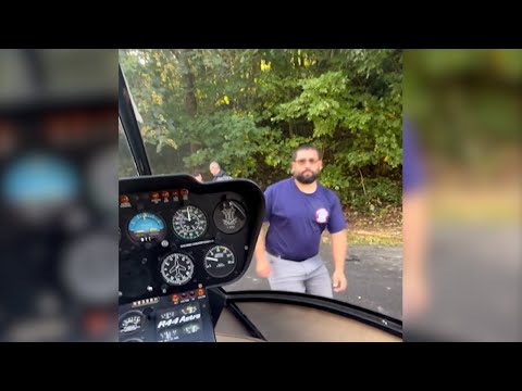 Couple saved in volunteer chopper rescue reunited, met with "angry" fire department at landing zone