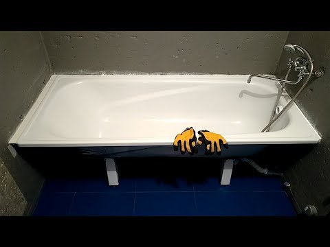 Extending a bathtub with a tile shelf. High-quality bathtub installation. Bathroom renovation. Pa...