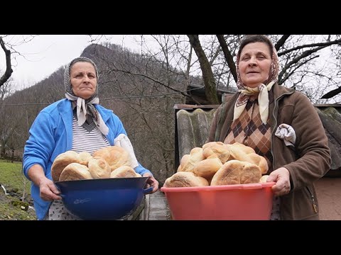Sisters baking bread high in a mountain village.