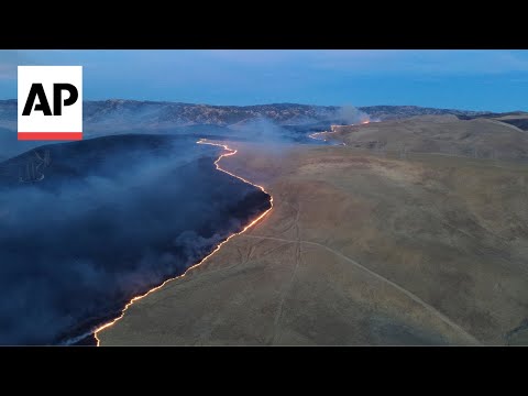 California firefighters continue battling wind-driven wildfire east of San Francisco