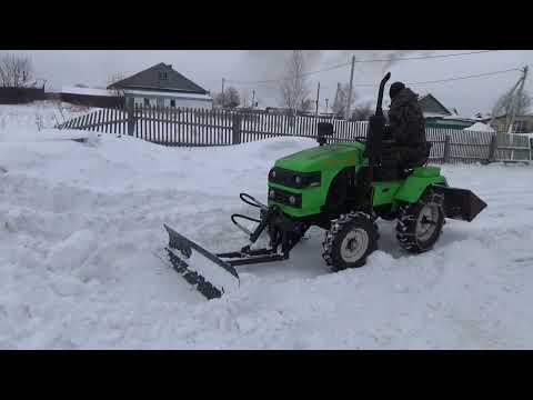 Уборка снега с отвалом на минитракторе Рустрак Р-18