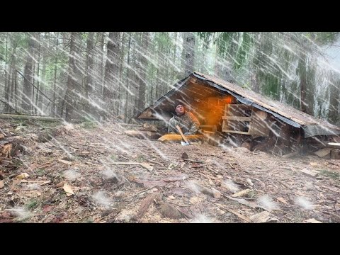 HIDING in a SMALL DUGOUT during SNOWFALL and RAIN