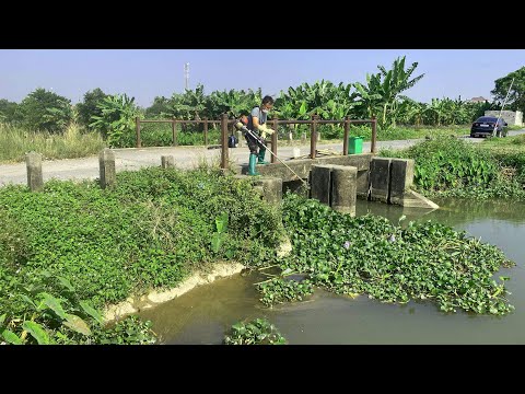 My city's fresh water source cuts grass pick up vegetation from clogged drains to help the community