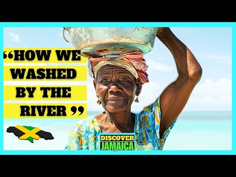 JAMAICANS WASHING CLOTHES BY THE RIVER IN THE 60S