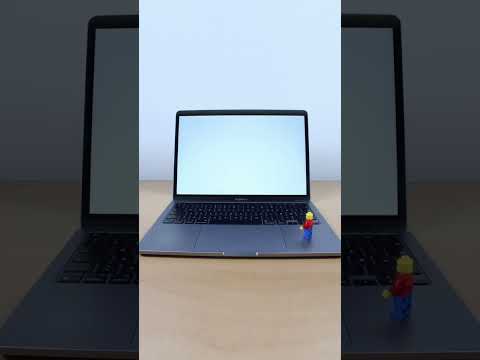 LEGO Minifigure typing on laptop