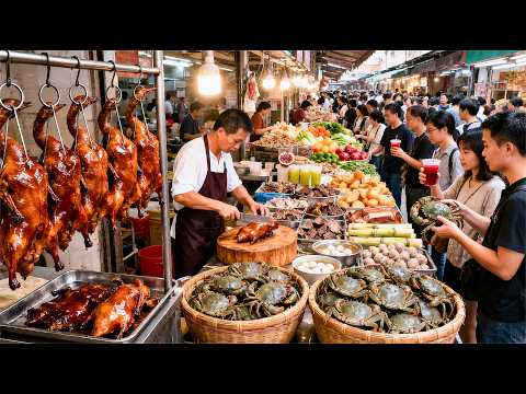 At the Liantang Comprehensive Market in Shenzhen, China, during peak season for hairy crabs, shop...