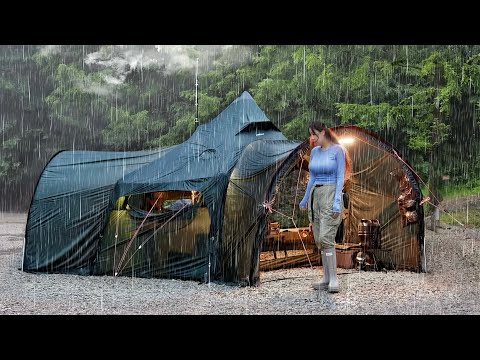 INTERESTING SPACE STATION SHAPED INFLATABLE TENT CAMPING WITH WOODSTOVE IN THE RAIN