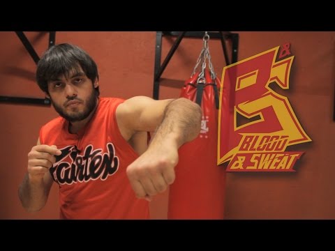 Левый боковой. Как правильно бить, работа ног, корпуса, спины. Техника бокса. Эльмар Гусейнов.