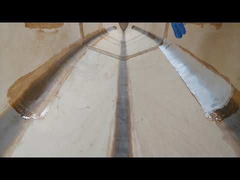 Fiberglassing a stitch and glue plywood canoe, until it becomes something else