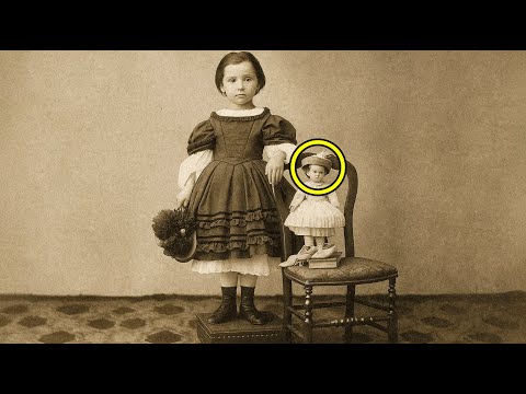Little Girl Poses for Photo with Doll—100 Years Later, Experts Turn Pale When They Zoom In!
