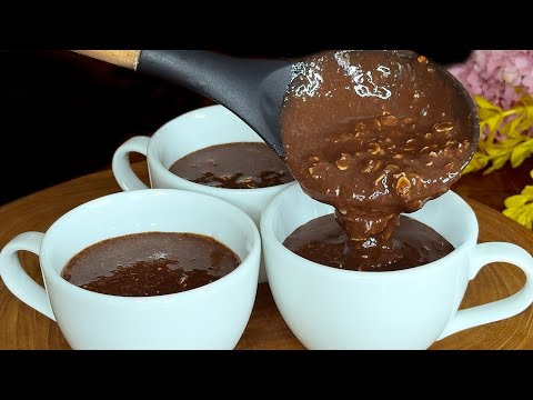 Combine oats and a spoonful of cocoa in a mug. Super easy and delicious mug cake.