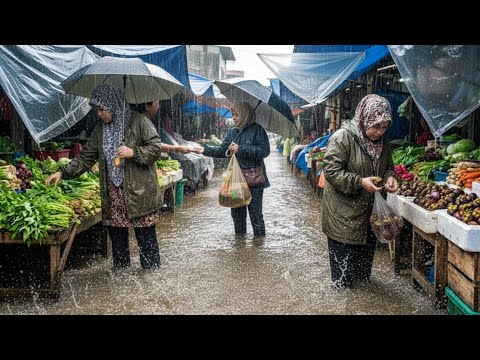 walking in the pouring rain at a traditional Indonesian market | trading activities continue