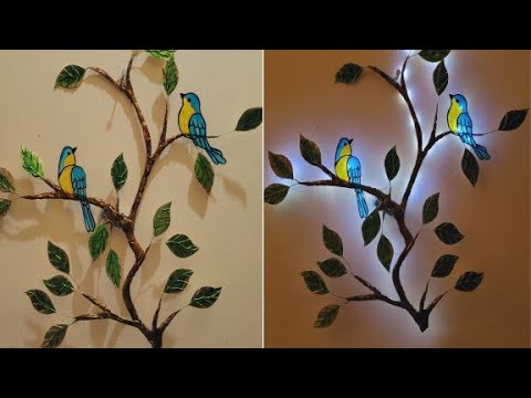 ELEGANTE RAMA decorativa de botella y cartón. ELEGANT decorative branch made of bottle and cardboard