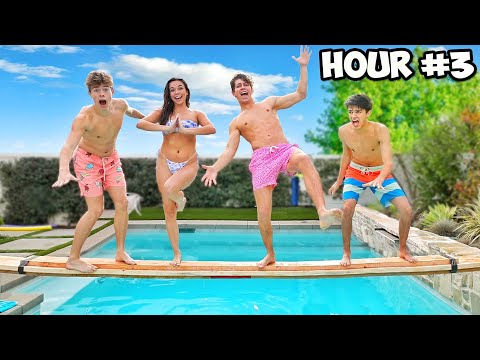 LAST TO FALL IN THE POOL WINS $1,000 CHALLENGE! **FREEZING**