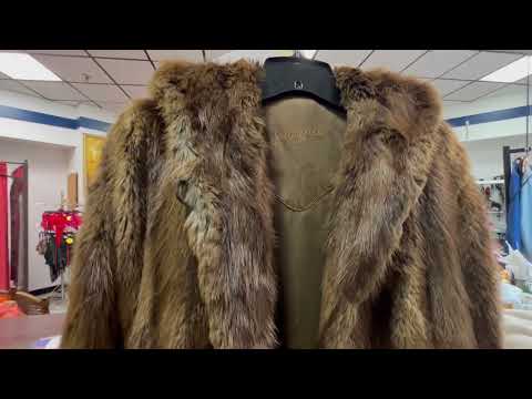 I bought zippers and threads, but the store didn't have any more. They brought my fur coat in for...