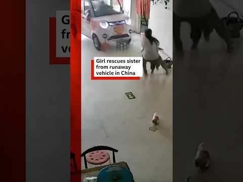 Girl rescues sister from runaway vehicle in China | BBC News