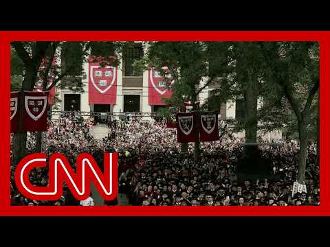 Harvard president gets a minute-long standing ovation as commencement program starts