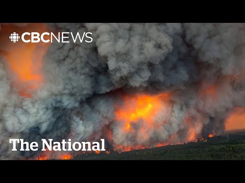 Crews focus on defence as several Prairie wildfires merge