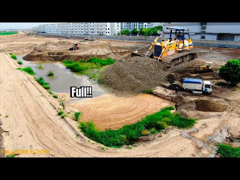 Amazing Full process of filling huge size flooded land operate pushing by Komatsu Bulldozer