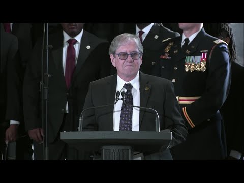 Jimmy Carter's son speaks at Carter Center memorial service