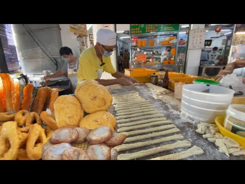 怡保一档炸油条，蓬松又酥脆，从开档到歇业手都没停过，炸都来不急卖，老板搬到哪儿，老顾客就跟到哪儿……