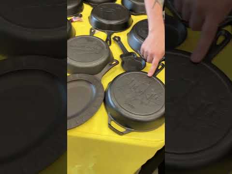 Ken Margraff shows off Lodge Cast Iron logo skillets