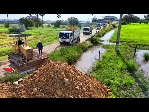 Massive stone fill project powered by strong dozer KOMAT’SU and heavy dump truck 5Ton, Mix VDO