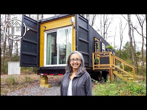 Her fabulous shipping container home in a tiny house village