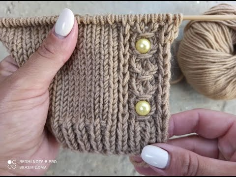 We knit an original, one-piece knitted strip for a cardigan or sweater.