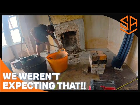 THIS CHIMNEY BREAST HAD A FEW SURPRISES FOR US!!