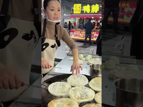 Delicious fried scallion pancakes at the night market food stalls