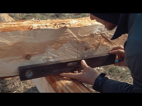 How To Build A Log Cabin - Simple Straight Lap Notch From Hewn Logs